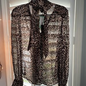 Women’s Brand new top with tags. Size S